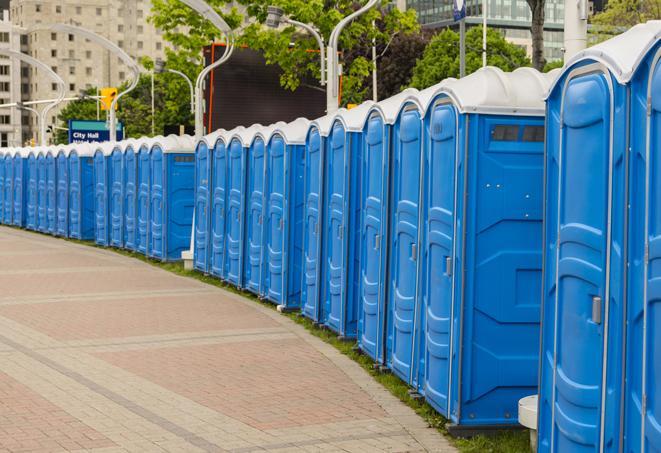a row of portable restrooms at a fairground, offering visitors a clean and hassle-free experience in londonderry